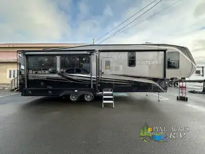 Dutchmen Astoria Platinum Series fifth wheel 3173RLP highlights: Kitchen Island 16 Cu. Ft. Refrigera...