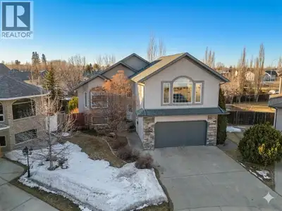 WHAT A LOCATION on this massive modified bi-level, tucked away on a quiet cul-de-sac in desirable De...