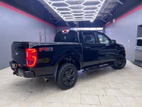 Experience the robust capability and stylish design of the 2020 Ford Ranger XLT, featuring a strikin... (image 6)
