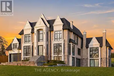 A statement in craftsmanship and design, this custom-built residence spans approximately 8,660 squar...