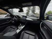 The 2013 BMW 328i xDrive F30 represents the transition to the high-efficiency, turbocharged four-cyl... (image 8)