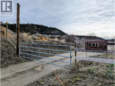 12.3 ACRES of agricultural land with lake, valley and city views. Sewer and water on gently sloping...
