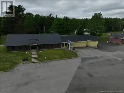 Endless potential in a prime commercial location! Two buildings: Car wash & former store that could...