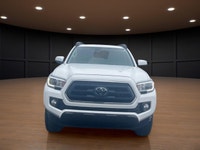 Price includes $1,000 finance credit. Price does not include fees or taxes. The 2023 Toyota Tacoma 4... (image 2)