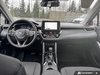 Navigate Canadian roads with confidence in this versatile 2024 Toyota Corolla Cross LE. Finished in... (image 9)