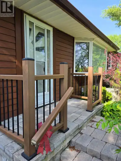 Beautiful 2-bedroom, 2-bathroom detached home available for lease. Nestled among beautiful mature tr...