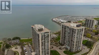 Wake up to breathtaking, unobstructed views of Lake Ontario from this sun-drenched corner residence,...