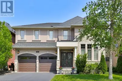 This beautiful family home is a rare Gem, located in the Prestigious Lakeshore Woods Community, back...