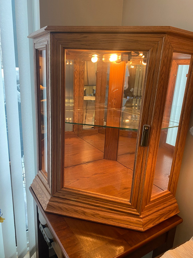 Corner Curio made by Buhler Hutches & Display