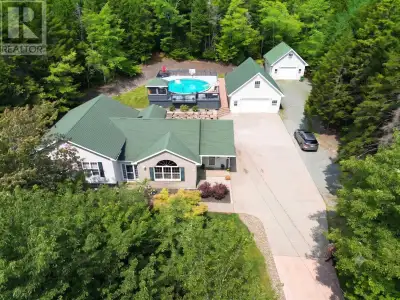 Welcome to 52 Wilson Lake Drive. Your own private retreat, where space, privacy and thoughtful outdo...