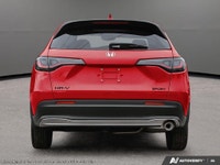 Get behind the wheel of the vibrant red 2027 Honda HR-V Sport AWD, engineered for all-weather condit... (image 4)