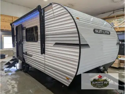 Sunset Park RV Sun Lite LTD 19RK highlights: Bar Top Bedroom Closet Wall A/C 12' Power Awning You're...