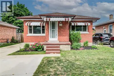 Welcome to 468 Highland Road East, Kitchener, a beautifully updated brick bungalow with a fully fini...