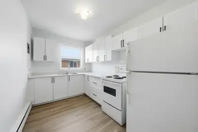 Amenities: Heat & Water Included • Air Conditioning • Keyless Entry Suite & Building: Spacious one-b...