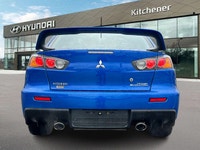 Octane Blue Pearl 4D Sedan 2.0L DOHC 5-Speed Manual AWD AWD, 4-Wheel Disc Brakes, ABS brakes, Air Co... (image 3)