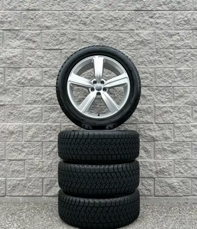 Bridgestone Blizzak DM-V2 Snow Tires and original 20 inch Audi Q8 ETron Sportback Silver Rims. Good...