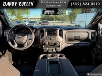 The 2026 Chevrolet Silverado 2500HD Custom is a striking white truck with a powerful 44 drivetrain t... (image 7)