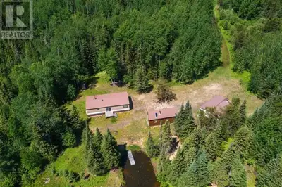New Listing. Bear Camp offers a truly unique off-grid living experience! The main building site boas...