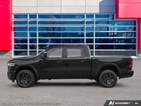 This Ram 1500 has a strong Twin Turbo Regular Unleaded I-6 3.0 L/183 engine powering this Automatic... (image 3)