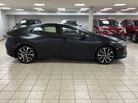 Rush-hour traffic slows to a crawl, but the cabin around you feels more like a modern tech lounge th... (image 6)