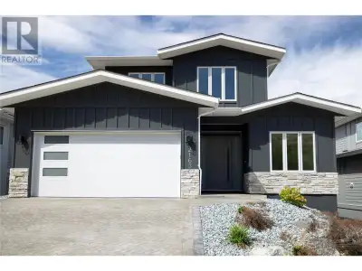 This new custom-built home in the prestigious Tower Ranch community showcases modern elegance and th...
