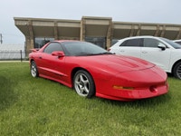 La Pontiac Firebird Trans Am 1994 est lun des modèles les plus emblématiques de lère des voitures sp... (image 2)