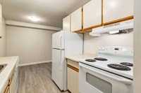Amenities: Heat & Water Included • In-suite Laundry • Air Conditioning Suite & Building: Spacious on... (image 8)