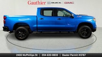 The 2024 Chevrolet Silverado 1500 Custom Trail Boss is a rugged off-road--focused pickup that comes... (image 1)