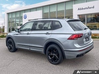The 2024 Volkswagen Tiguan Comfortline R-Line Black Edition elevates every journey with its distinct... (image 2)