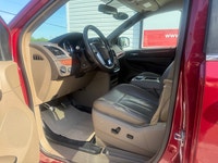 A spacious family minivan with comfortable seating, convenient features, and versatile cargo space,... (image 8)