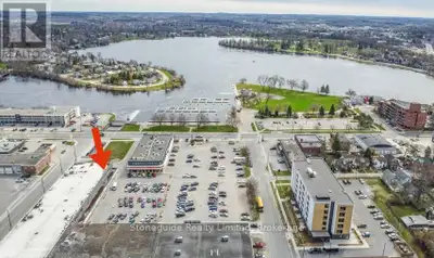 End cap lease unit with 3,859 sq ft main floor area. Prime downtown location in a very busy plaza ac...
