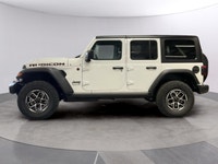 Introducing the stunning 2026 Jeep Wrangler Rubicon in a crisp white finish, delivering exceptional... (image 1)