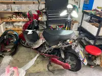 Réparation de scooter triporteur de marque Gio seulement