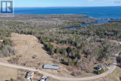 Set along a quiet, year-round road with an impressive 430 feet of frontage, this expansive 45-acre p...