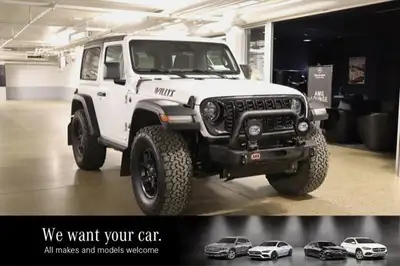 This Jeep WRANGLER has a strong Intercooled Turbo Premium Unleaded I-4 2.0 L/122 engine powering thi...