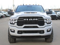 Renfrew Chrysler is proud to offer this Loaded Laramie with a custom Space Grey vinyl wrap, custom m... (image 9)