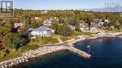 Welcome to 18 Keefe Drive, a stunning single-family bungalow offering 220 feet of pristine waterfron...