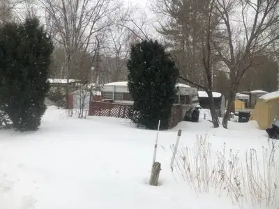 Stationed @ colborne trailer park (Comes with Land ) PICS attached. SELLING as it is. Not winterized...