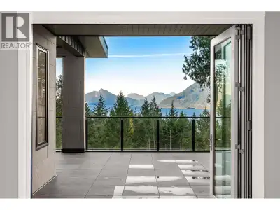 Custom home boasts OCEAN VIEWS & GORGEOUS SUNSETS! 4460sf of finished living+1,033 sf of outdoor pat...