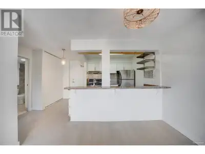 This beautifully renovated 1-bedroom condo in North Vancouver offers a perfect blend of modern comfo...