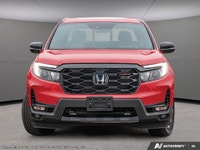 Introducing the 2026 Honda Ridgeline TrailSport AWD, a striking new truck that's unmissable in its b... (image 1)