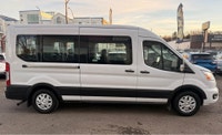**CARS TRUCKS SUV 4X4 VAN AWD EDMONTON FINANCING AVAILABLE EASY FINANCING ** 2022 FORD T-350 15 PASS... (image 1)