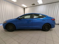 Finished in a confident Blue exterior with a clean Black interior, this pre-owned 2018 Hyundai Elant... (image 4)