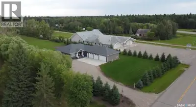 105 Tindall Avenue offers your dream of acreage living within minutes of town amenities—the best of...