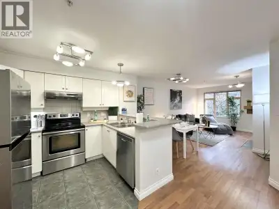 Bright 2 bedroom corner condo at The Crofton in the heart of Glenbrook North. Well designed open lay...