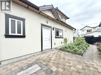 Furnished 2-bedroom, 1.5-bathroom laneway house in Vancouver, offering a private and practical livin...