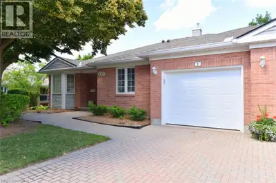 FANTASTIC END UNIT!! BUNGALOW IN RIVERWALK BACKING ONTO THE GRAND RIVER!! This bright and spacious B...