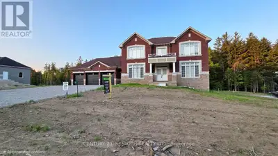 Welcome to 51 Ruby Ridge, a stunning, never-lived-in two-story home located in the prestigious Sugar...