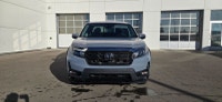 Our 2023 Honda Ridgeline Touring in Sonic Grey with the Honda Performance Development Package is in... (image 6)