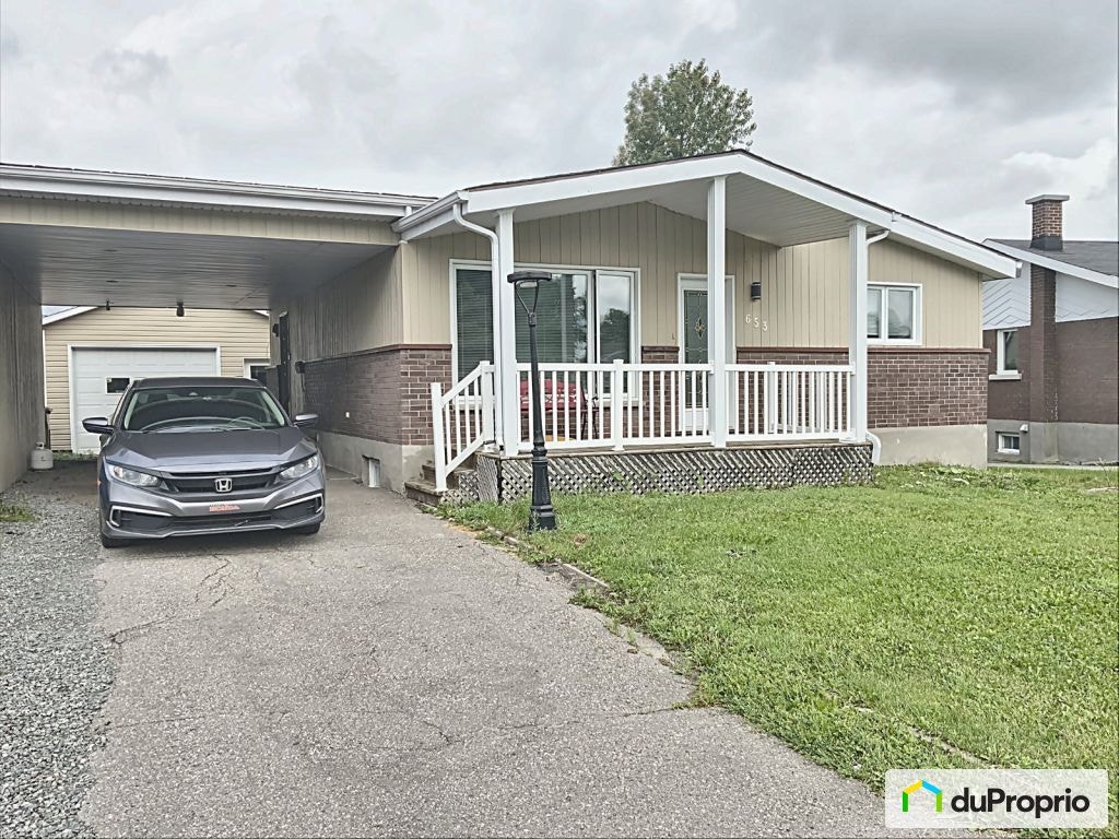 $450,000 - Bungalow for sale in Chicoutimi (Chicoutimi) — photo 1